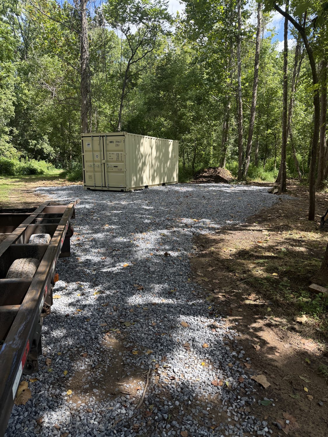 Storage container placed beside a home during a renovation